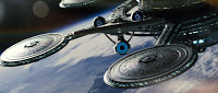 USS_Enterprise_(alternate_reality)_departs_Spacedock